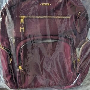 Tumi Men's Backpack in Burgundy with Gold Hardware